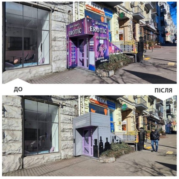 Комунальники прибрали незаконну рекламу з історичної будівлі у центрі Києва